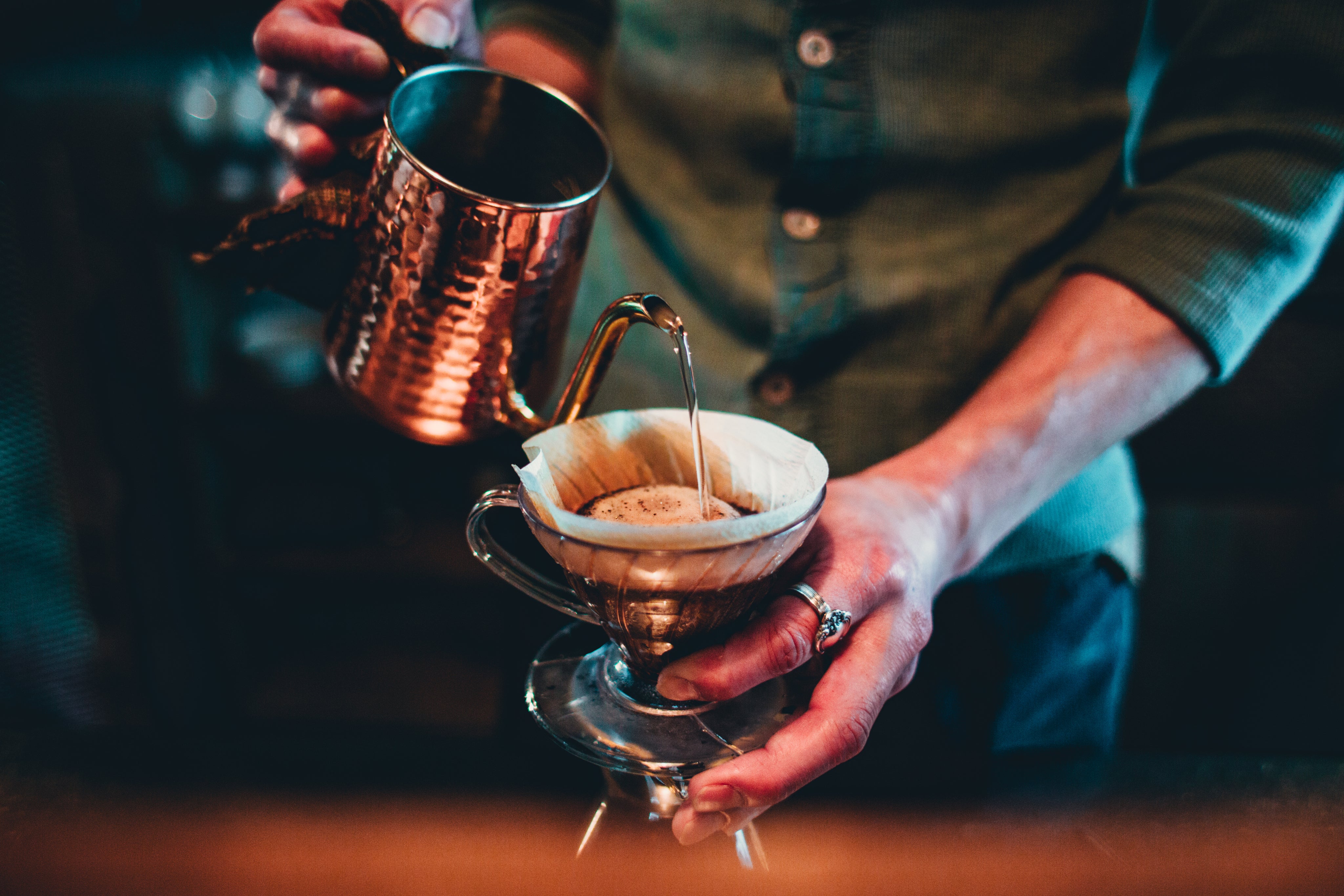 barista-pour-over-coffee-from-copper-kettle.jpg